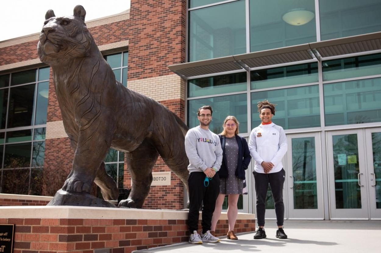 Damond Brown '21, CAPE Project Director Suzannah Rogan and Travis Handler '22